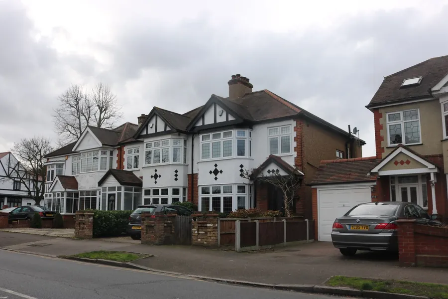 Mock Tudor semi-detached houses on Corbets Tey Road in Upminster with front drives and garages